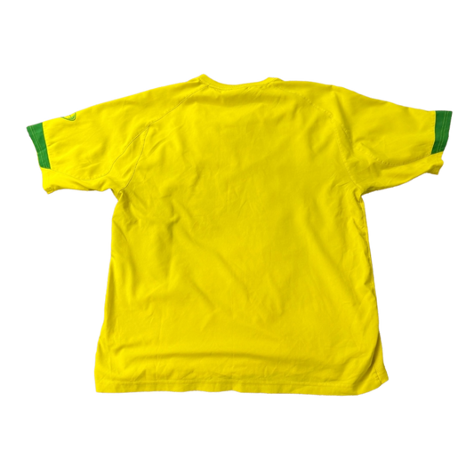 Vintage Nike T90 Yellow Brasil football T-shirt from the 2000s, featuring classic team branding and retro sports style.