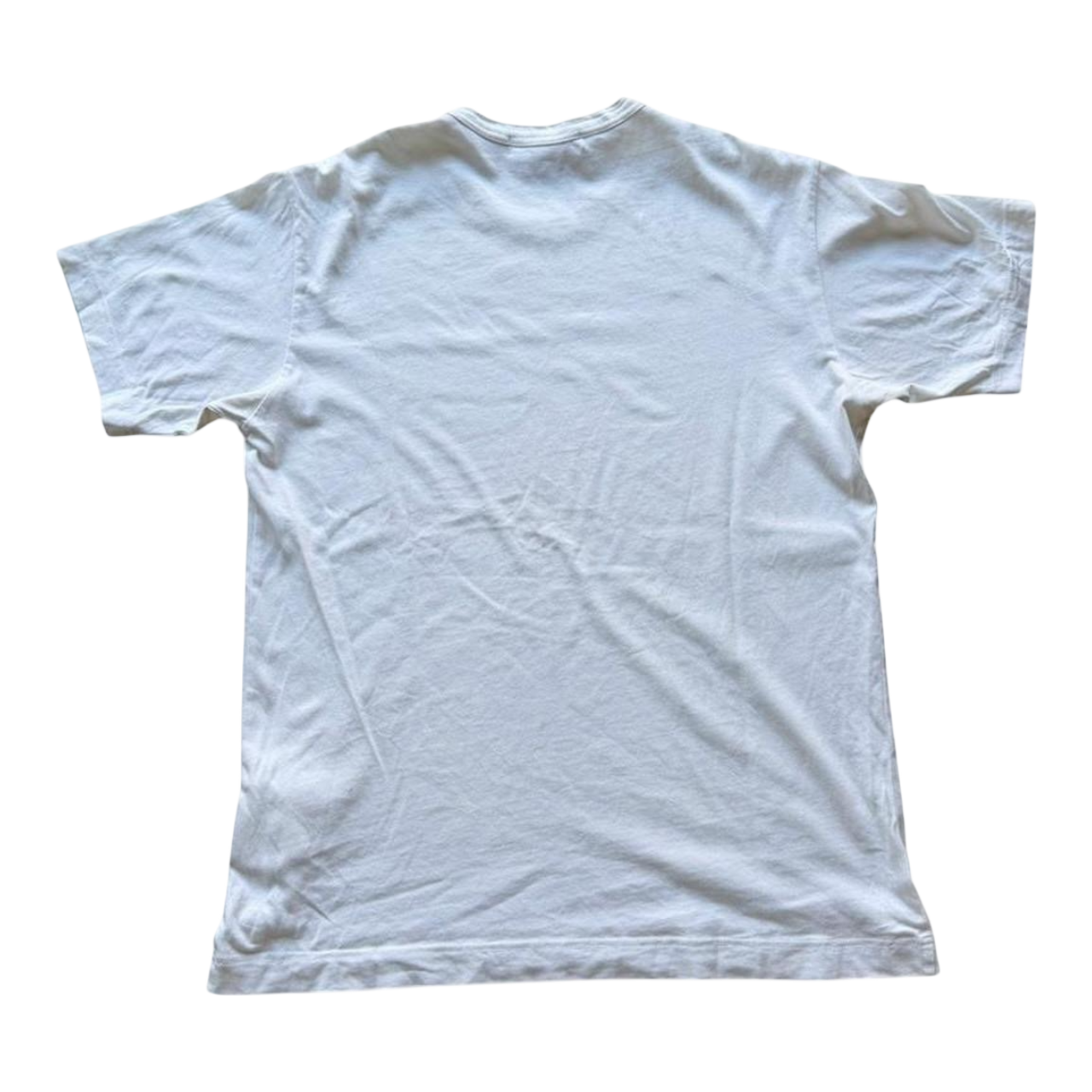 Comme des Garçons x KAWS graphic print T-shirt from The Hennessy Archive, featuring bold artwork on a casual cotton tee.