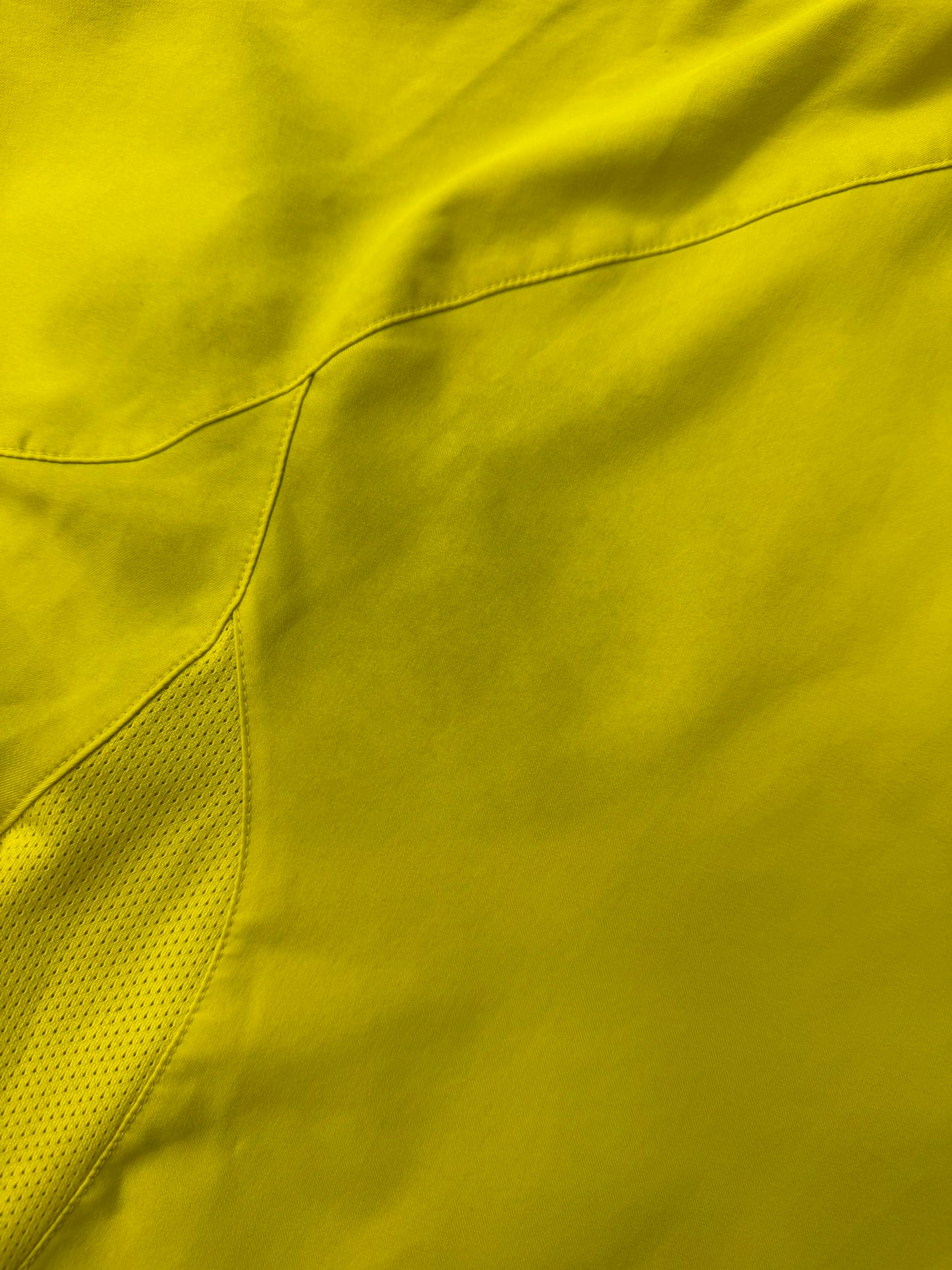 Vintage Nike T90 Yellow Brasil football T-shirt from the 2000s, featuring retro Nike branding and Brazil national team graphics.