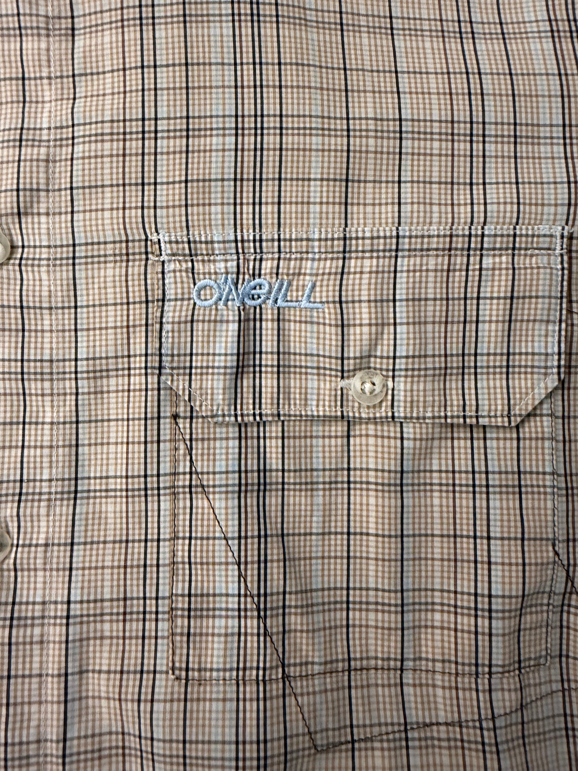 Vintage O'Neill striped button-up polo shirt from the Y2K Surf 2000s collection, featuring bold horizontal stripes and classic fit.