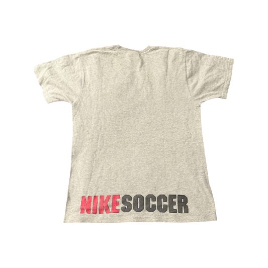Vintage Nike soccer T-shirt by The Hennessy Archive, Y2K grey 2000s style, featuring classic Nike logo and sporty design.